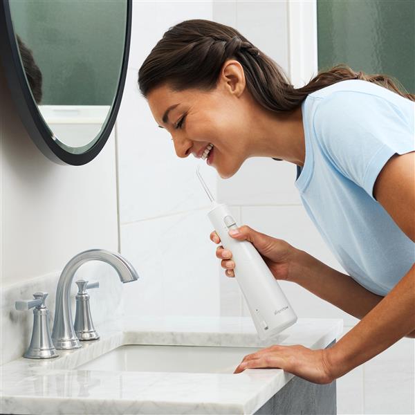 White Waterpik™ Cordless 1100 Water Flosser - Image 2