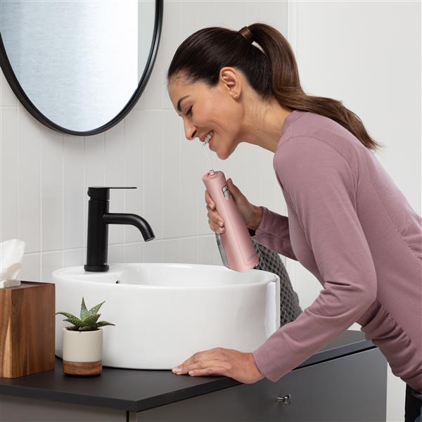 Pink Waterpik™ Cordless Revive Water Flosser - Image 3